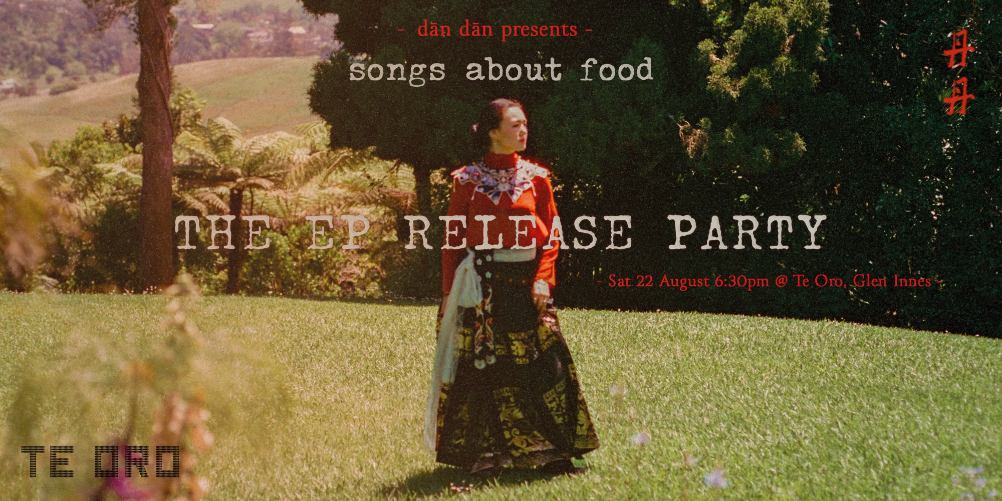 Release party banner: dān dān stands on a sunlit lawn in a red top and embroidered black and gold skirt. Text reads dān dān presents songs about food, the EP release party, Sat 22 August 6.30pm at Te Oro, Glen Innes.